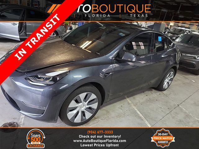 used 2024 Tesla Model Y car, priced at $33,000