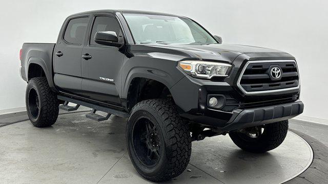 used 2016 Toyota Tacoma car, priced at $23,600