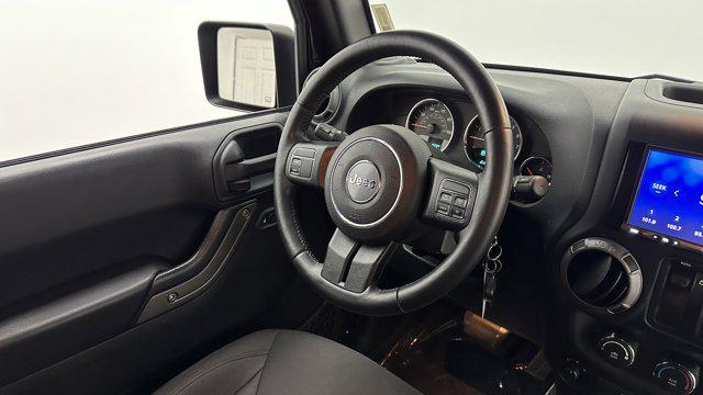 used 2015 Jeep Wrangler car, priced at $10,610