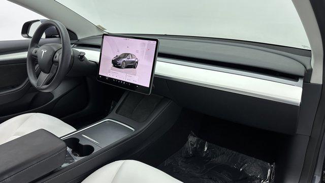 used 2023 Tesla Model 3 car, priced at $24,000