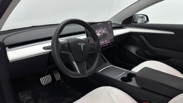 used 2023 Tesla Model 3 car, priced at $31,000
