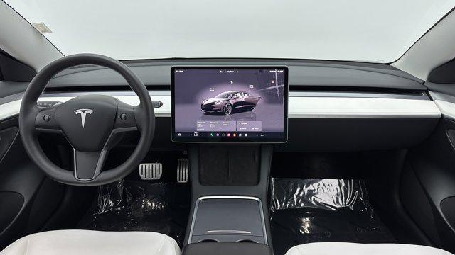used 2023 Tesla Model 3 car, priced at $31,000