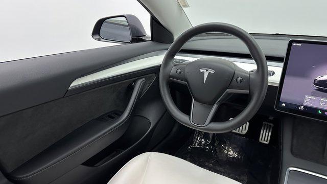 used 2023 Tesla Model 3 car, priced at $31,000