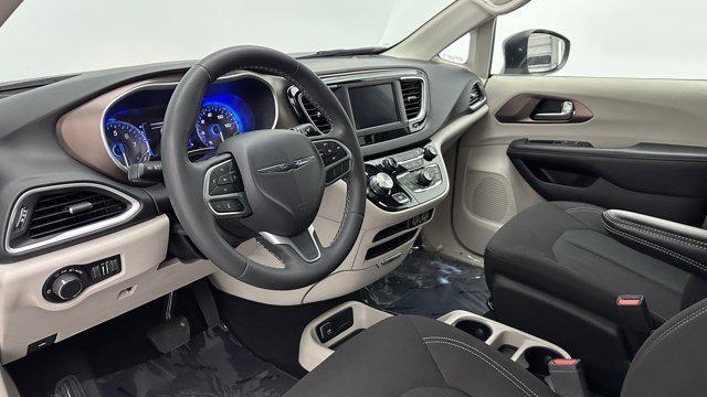 used 2023 Chrysler Voyager car, priced at $19,399