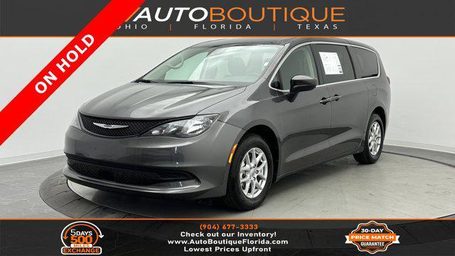 used 2023 Chrysler Voyager car, priced at $19,399