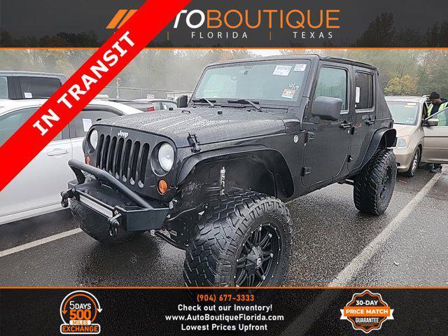 used 2013 Jeep Wrangler Unlimited car, priced at $17,400