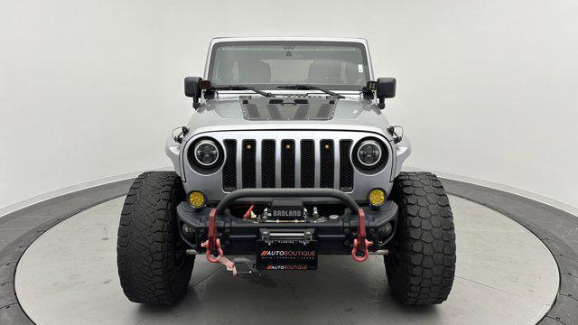 used 2013 Jeep Wrangler Unlimited car, priced at $16,800