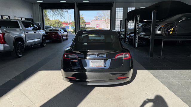 used 2022 Tesla Model 3 car, priced at $19,000