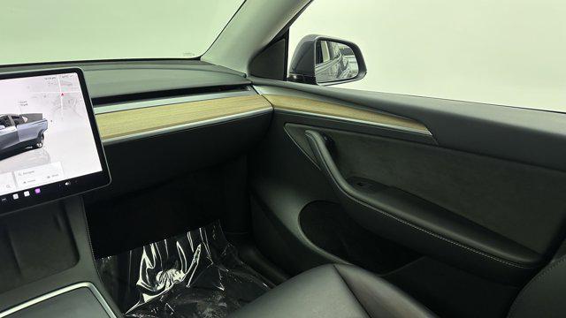 used 2023 Tesla Model Y car, priced at $27,900