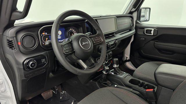used 2025 Jeep Wrangler car, priced at $38,600