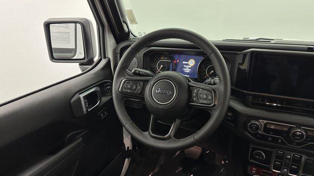 used 2025 Jeep Wrangler car, priced at $38,600