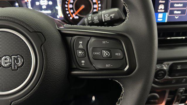used 2025 Jeep Wrangler car, priced at $38,600