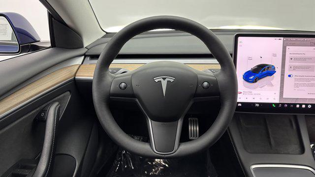used 2023 Tesla Model 3 car, priced at $30,200