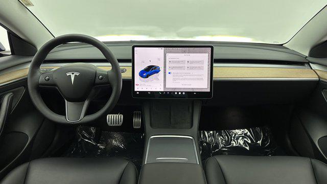 used 2023 Tesla Model 3 car, priced at $30,200