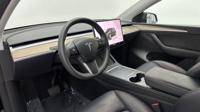used 2024 Tesla Model Y car, priced at $31,900