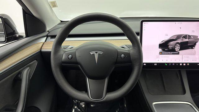 used 2024 Tesla Model Y car, priced at $31,900