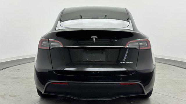 used 2024 Tesla Model Y car, priced at $31,900