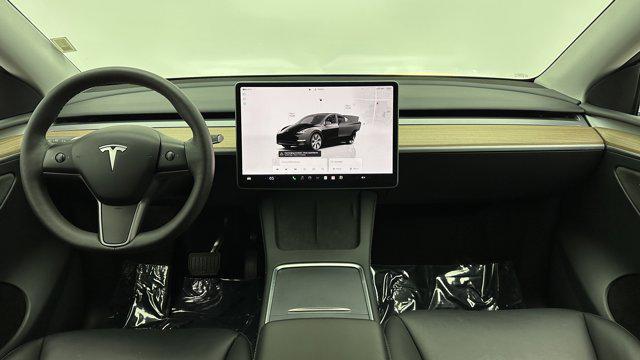 used 2024 Tesla Model Y car, priced at $31,900