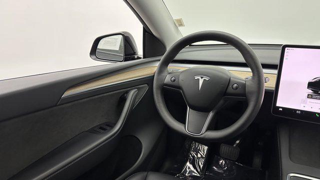 used 2024 Tesla Model Y car, priced at $31,900