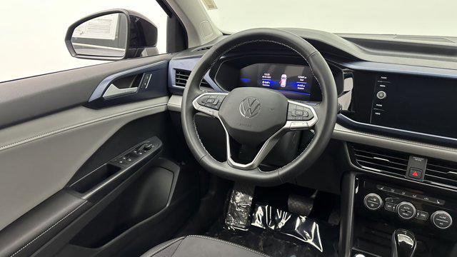 used 2024 Volkswagen Taos car, priced at $21,400