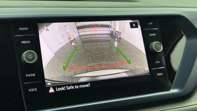 used 2024 Volkswagen Taos car, priced at $21,400