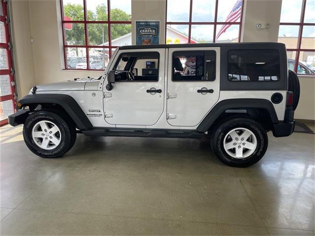 used 2011 Jeep Wrangler Unlimited car, priced at $15,900