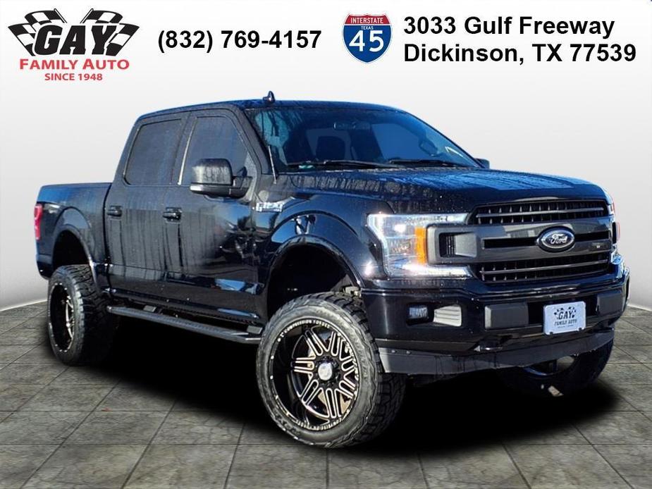 used 2018 Ford F-150 car, priced at $26,991