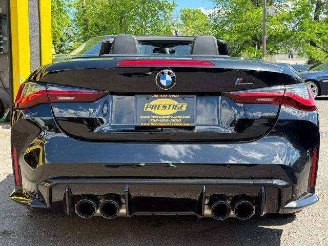 used 2022 BMW M4 car, priced at $57,995