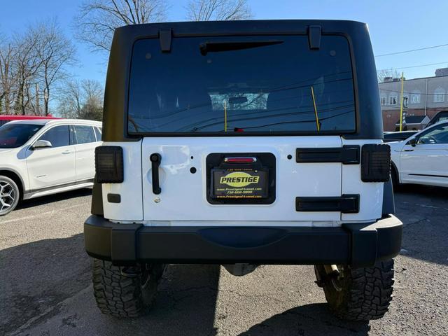 used 2016 Jeep Wrangler Unlimited car, priced at $21,995