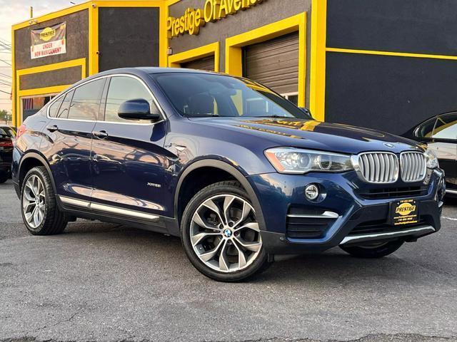 used 2018 BMW X4 car, priced at $20,795