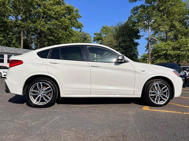 used 2018 BMW X4 car, priced at $26,995