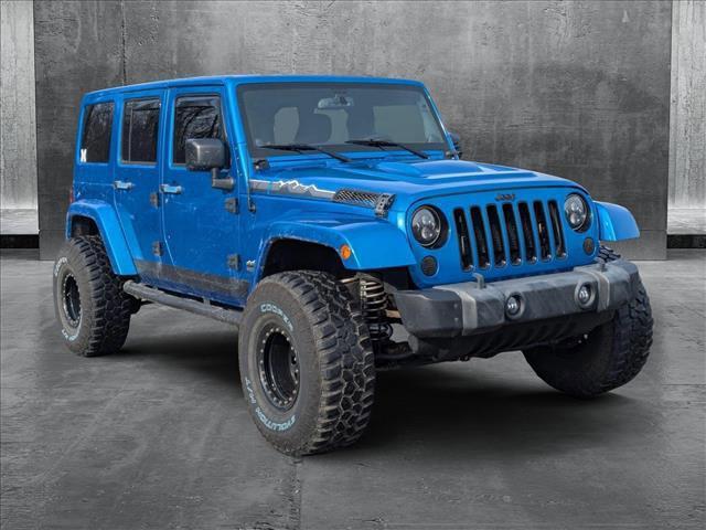 used 2014 Jeep Wrangler Unlimited car, priced at $15,698