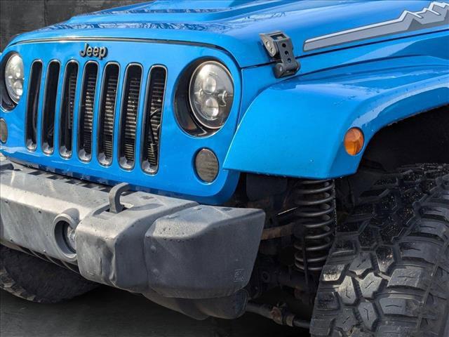 used 2014 Jeep Wrangler Unlimited car, priced at $15,698