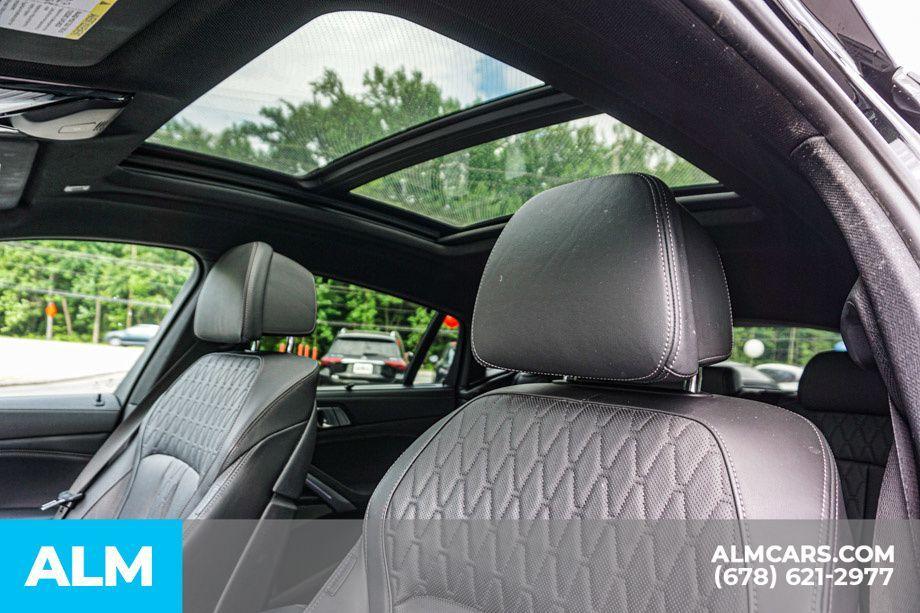 used 2023 BMW X6 car, priced at $62,920