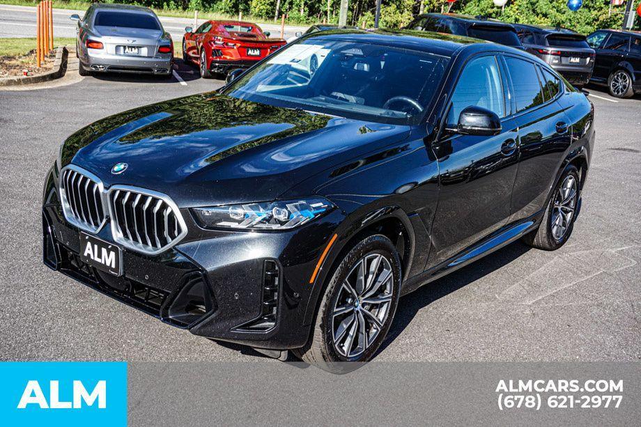 used 2024 BMW X6 car, priced at $65,420