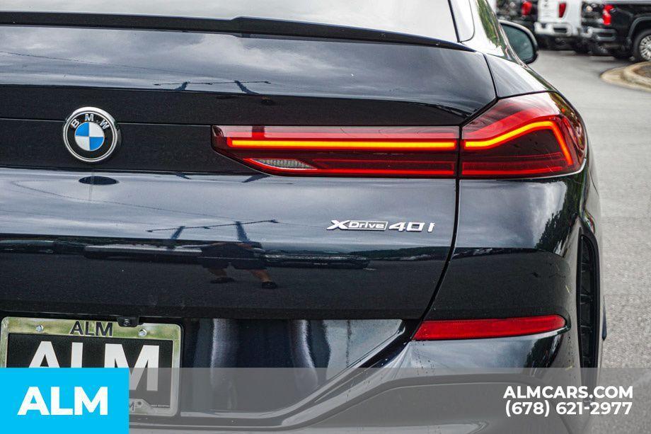 used 2024 BMW X6 car, priced at $58,920