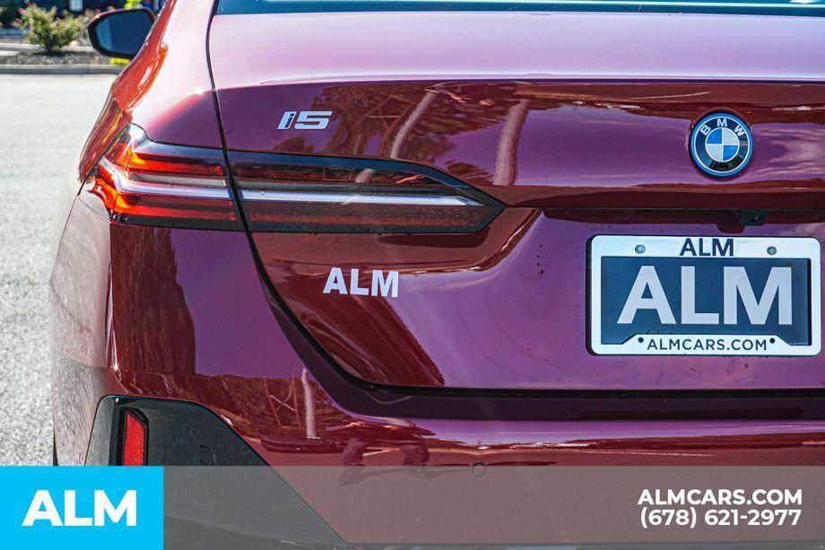 used 2025 BMW i5 car, priced at $57,420