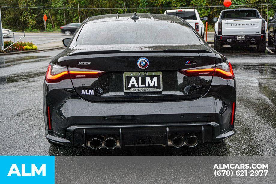 used 2023 BMW M4 car, priced at $75,420