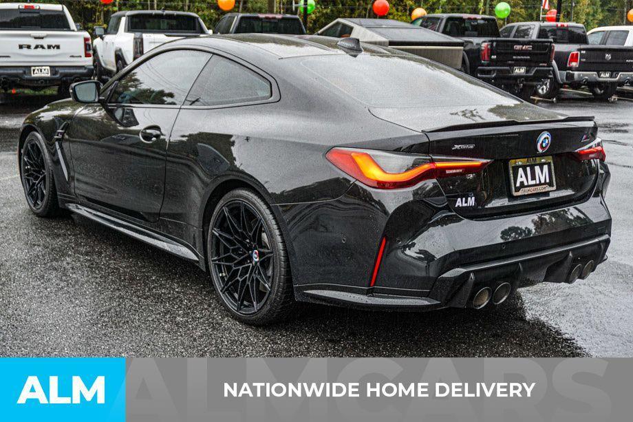 used 2023 BMW M4 car, priced at $75,420