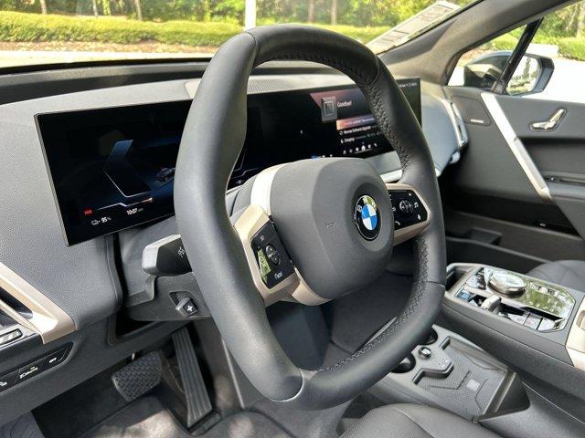 new 2026 BMW iX car, priced at $96,045
