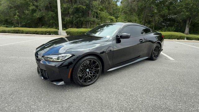 used 2024 BMW M4 car, priced at $86,000