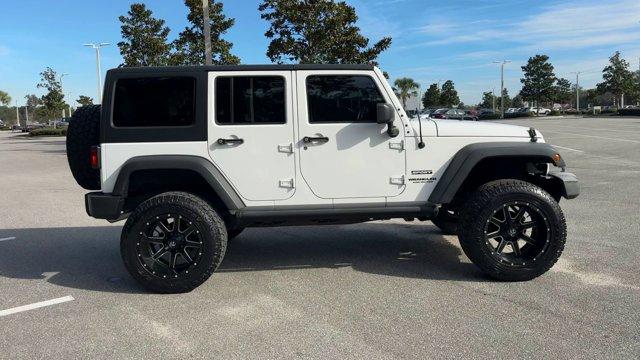 used 2017 Jeep Wrangler Unlimited car, priced at $21,443