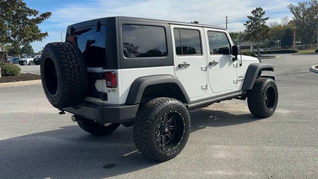 used 2017 Jeep Wrangler Unlimited car, priced at $21,443