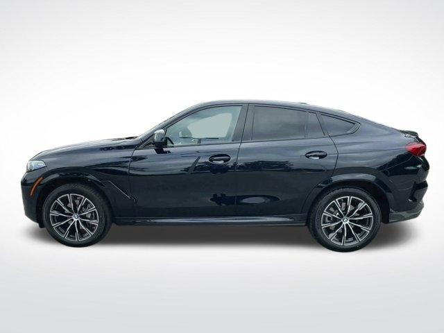 new 2025 BMW X6 car, priced at $77,875