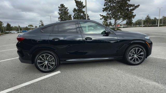 new 2025 BMW X6 car, priced at $77,875