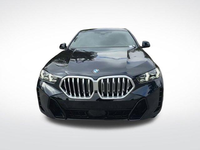 new 2025 BMW X6 car, priced at $77,875