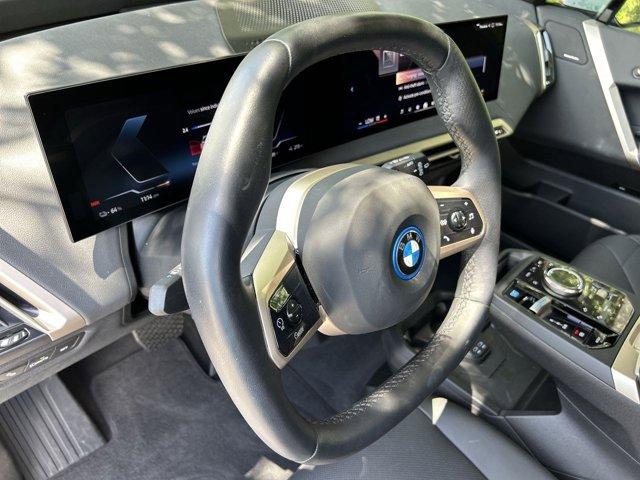 used 2024 BMW iX car, priced at $88,340