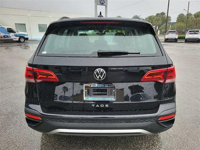 used 2024 Volkswagen Taos car, priced at $21,695