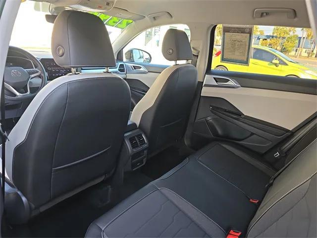 used 2025 Volkswagen Taos car, priced at $23,999