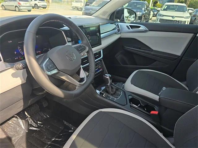 new 2025 Volkswagen Taos car, priced at $26,427